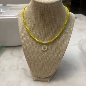 #15. Handmade Yellow Beaded Necklace with Flower Pendant
